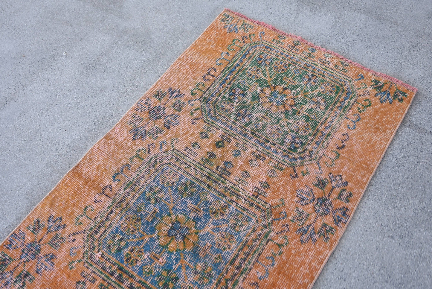 Vintage Orange Wool Rug: Geometric & Floral Design