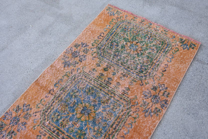 Vintage Orange Wool Rug: Geometric & Floral Design