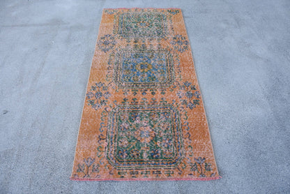 Vintage Orange Wool Rug: Geometric & Floral Design