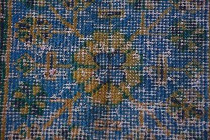 Vintage Orange Wool Rug: Geometric & Floral Design