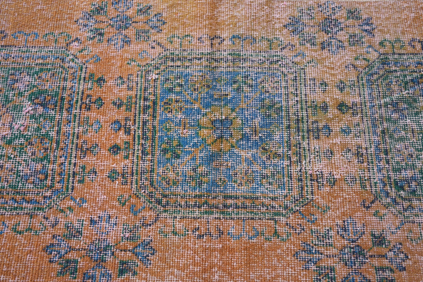 Vintage Orange Wool Rug: Geometric & Floral Design
