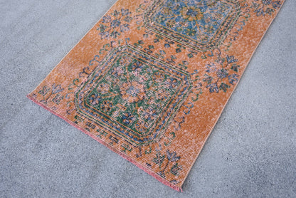 Vintage Orange Wool Rug: Geometric & Floral Design